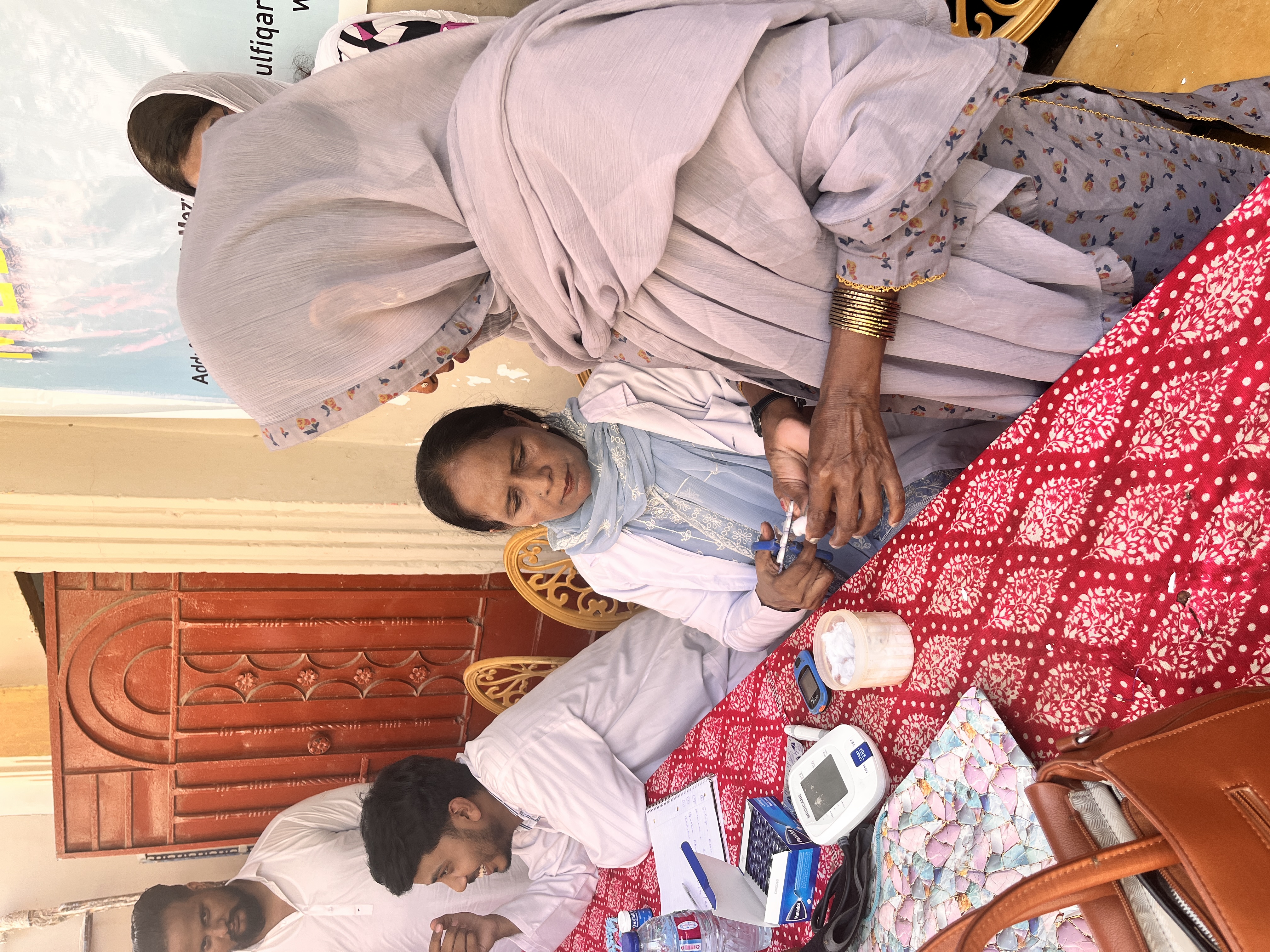 Community members receiving medical support